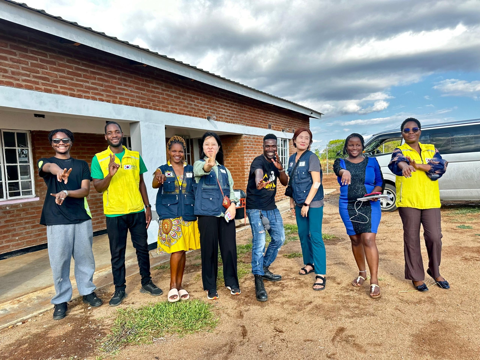 Valentino Vincent Molosen with his crew and partners on location in rural Malawi