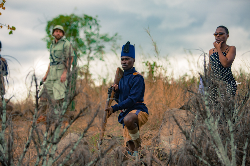 Period drama scene being filmed on location in the Malawian bush
